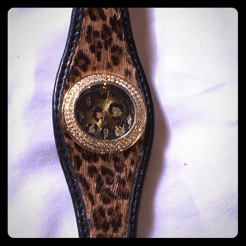 Guess hide on hair watch. Leather band